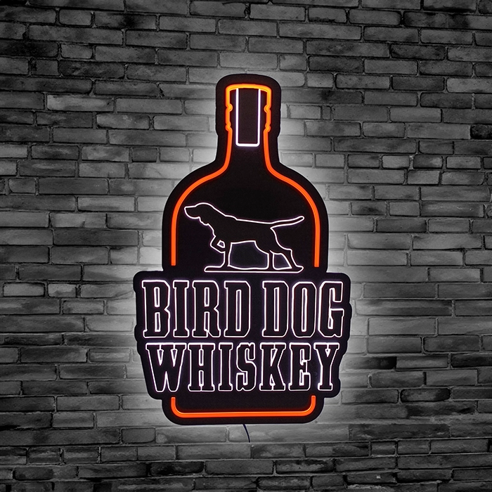 Bird Dog Whiskey Bottle with dog LED Neon sign against black brick wall