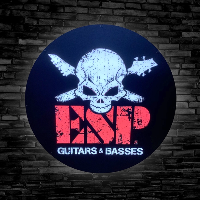ESP-Guitar-Basses-LED-Signs-02 ESP Guitars & Basses with Skull and Guitar heads as cross bones LED bar sign against black brick wall