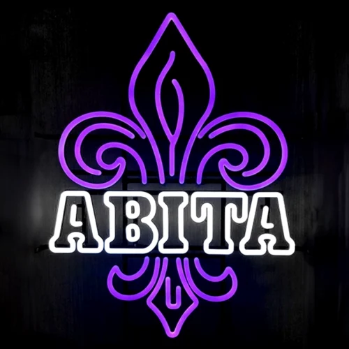 A custom purple LED neon sign with the word abita on it.