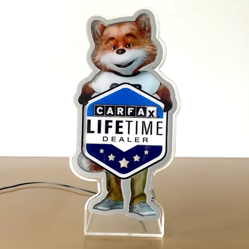 A carfax lifetime non-illuminated sign with a fox holding a sign.