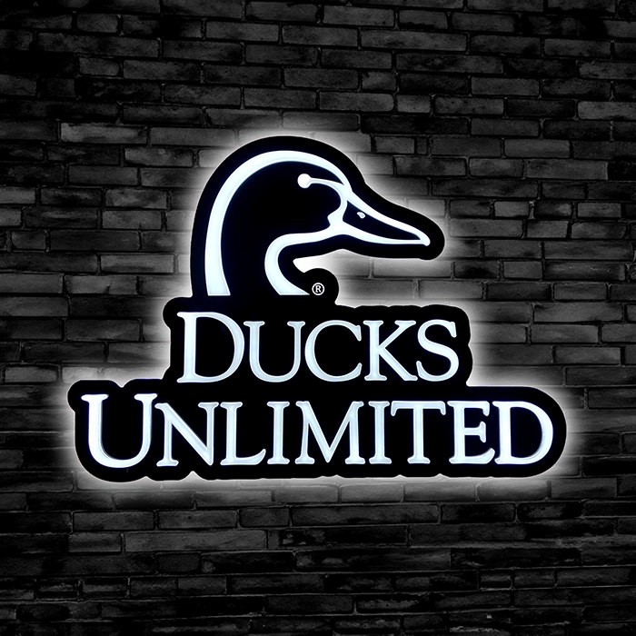 Ducks unlimited custom LED sign on a black brick wall