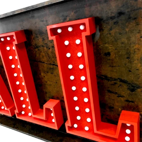 A red and white non-illuminated sign with the word 'Fireball' on it.