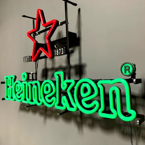 LEDON Signage Heineken neon sign hanging on a wall.