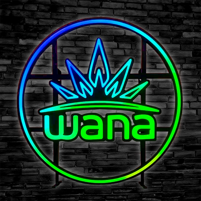 Color motion LED Neon Signage with the word "wana" inside a circle, featuring a crown design on top, displayed against a brick wall background.