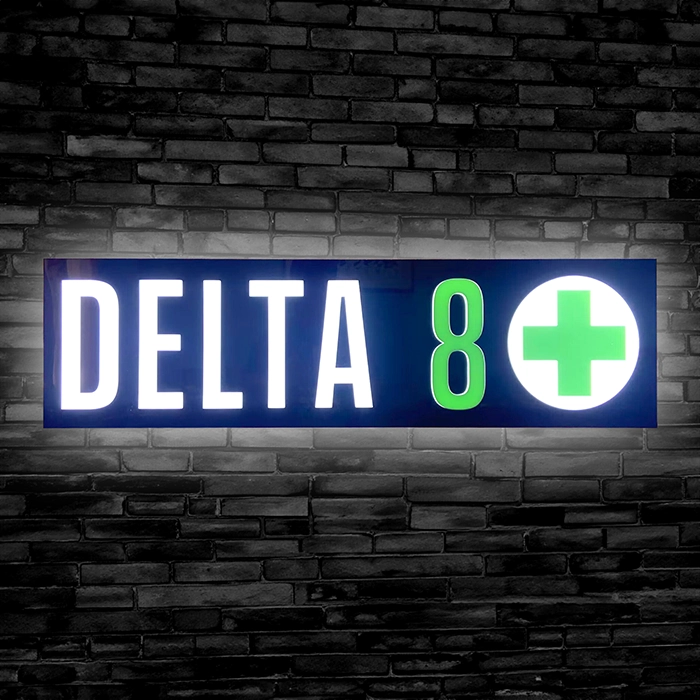 Delta 8 Neon LED Sign for Hemp Cannabis Store. White letters on Navy Blue with green Cross.