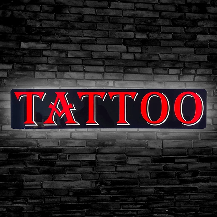 LED Neon Tattoo Sign for Tattoo Parlor Window. Glowing Red Letters on Black background.