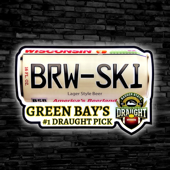 BRW-SKI Lager Green Bay LED Beer sign against a black brick wall