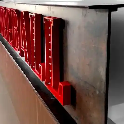 A non-illuminated red sign with the word Fireball.